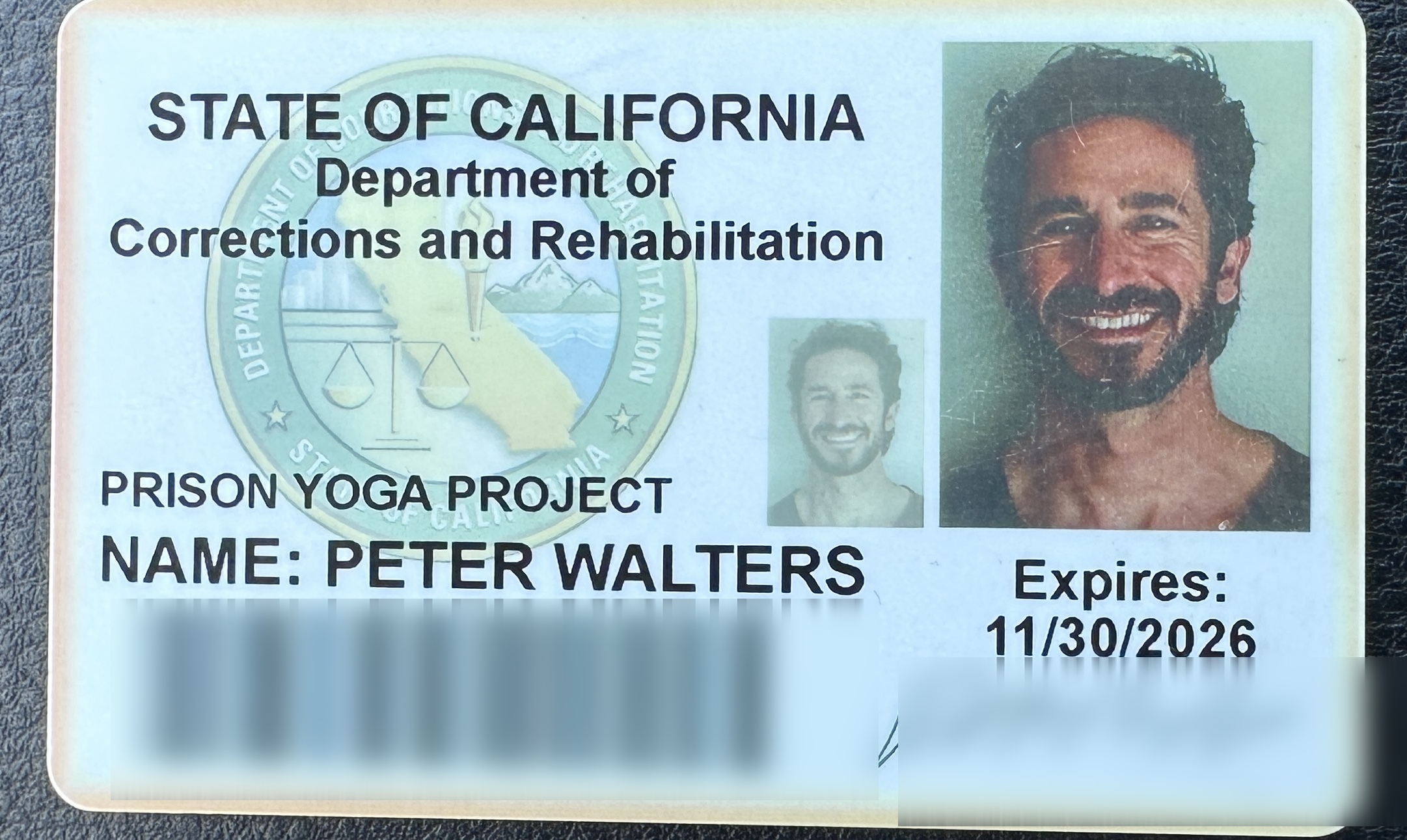 Peter Walters California Department of Corrections and Rehabilitation volunteer ID badge for the Prison Yoga Project, valid through November 2026.